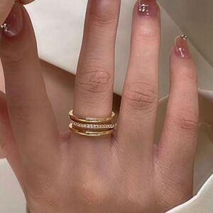 The Triple Bling Ring adjustable in 14k gold over 925 with cubic zirconia